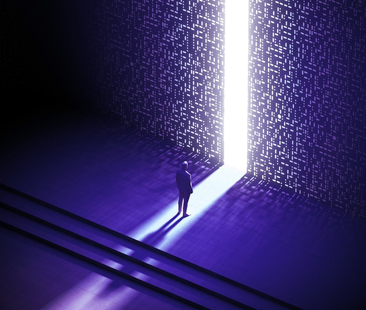 Person standing before a glowing door.
