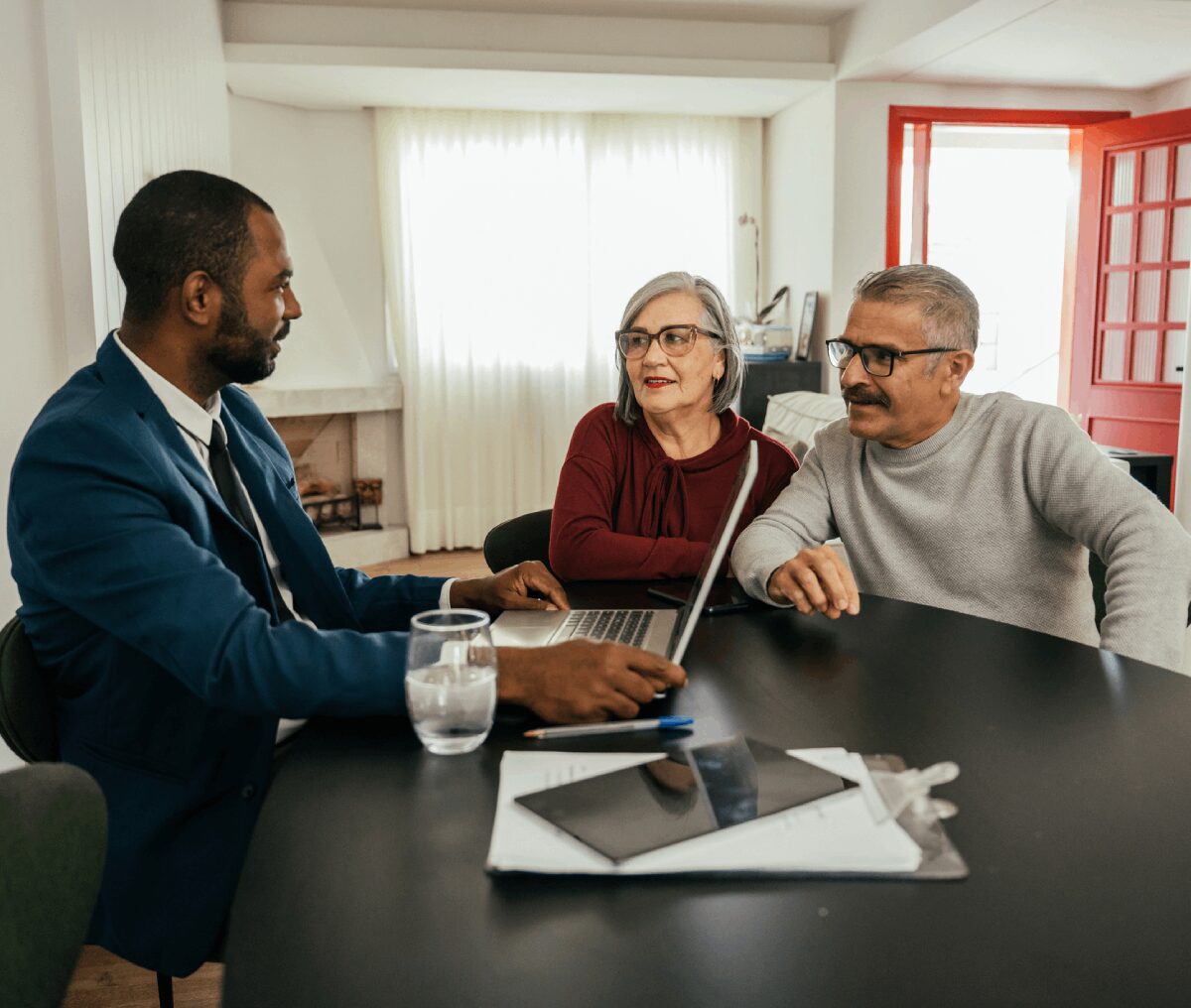 Meeting with a financial advisor at home.