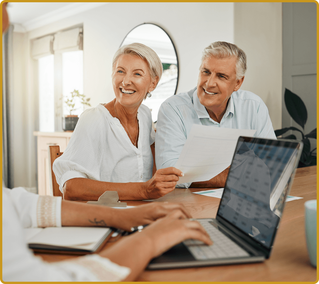 Seniors discussing paperwork at home